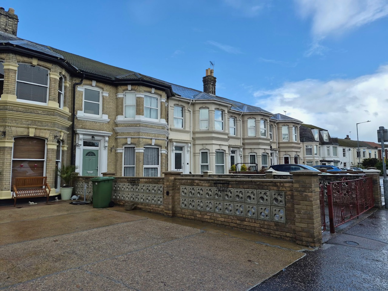 Terraced homes with shared walls, photographed by Vyckie Abbott